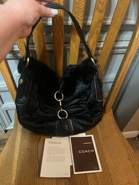 Coach SoHo ski Black rabbit Fur-Trim Shoulder Bag with Gold Hardware.